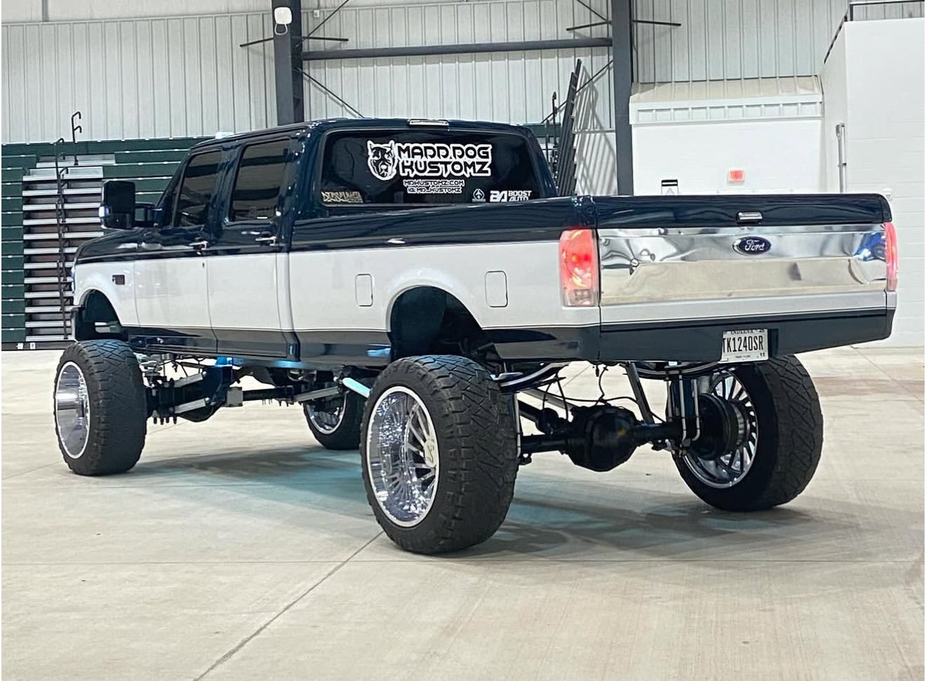 Lifted Ford truck in the showroom