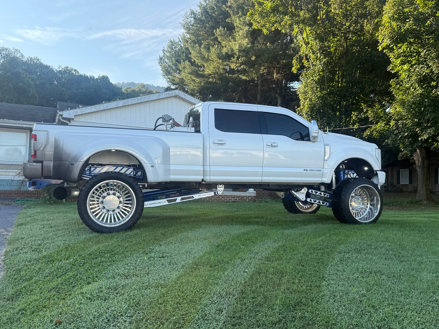 White Ford truck with MDK suspension